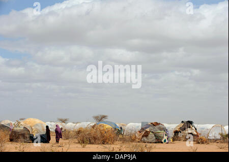 Thousands of tents are forming one of three refugee camps in Dadaab, Kenya 4 August 2011. Somalia and parts of Kenya have been struck by one of the worst draughts and famines in six decades, more than 350 000 refugees have found shelter in the worlds biggest refugee camp. Photo: Boris Roessler Stock Photo