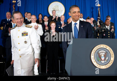 Chairman of the Joint Chiefs of Staff Admiral Michael Mullen introduces United States President Barack Obama before a speech about the administration's efforts to prepare the nation's veterans for the workforce at the Washington Navy Yard in Washington, DC, Friday, August 5, 2011. .Credit: Olivier Douliery / Pool via CNP Stock Photo