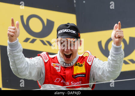 Swedish German Touring Car Masters (DTM) race driver Mattias Ekstroem of Audi Sport team Abt Sportsline celebrates his victory at the Nuerburgring in Nuerburg, Germany, 07 August 2011. Photo: ITR/ JUERGEN TAP Stock Photo