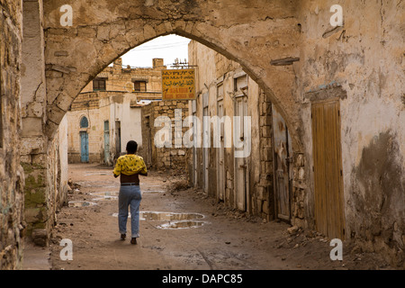 Africa, Eritrea, Massawa, Old Town, building materials shop amongst dilapidated buildings Stock Photo