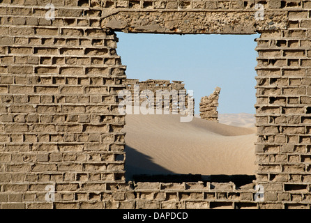 Eroded walls with see- through at Hottentots Bay, Namibia Stock Photo