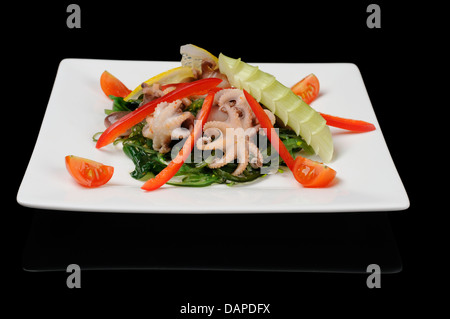 Japanese sea food salad on black background Stock Photo