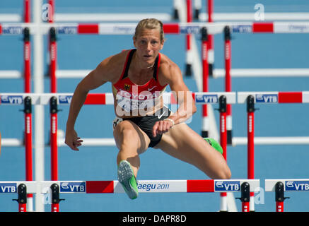 Jennifer Oeser of Germany competes in the womens 100 m Hurdels event of the Heptathlon competition at the 13th IAAF World Championships in Athletics, in Daegu, Republic of Korea, 29 August 2011. Photo: Bernd Thissen dpa Stock Photo