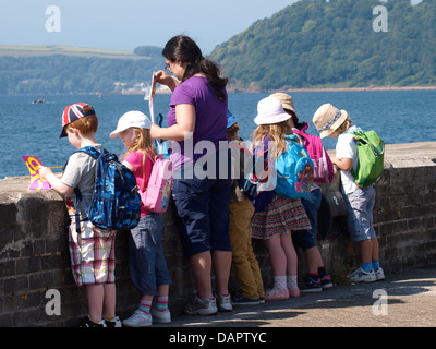 Young children on a school field trip to the Mount Batten Breakwater, Plymouth, UK 2013 Stock Photo