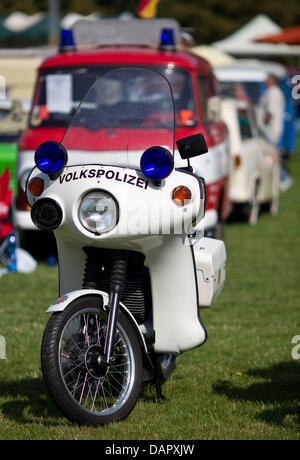 A motorcycle of the GDR police is exhibited during the 13th classic car exhibition 'Ost-Mobil-Meeting-Magdeburg' at Elbauenpark in Magdeburg, Germany, 3 September 2011. The meeting is organised by the IFA Friends of Saxony-Anhalt. Over 1000 vehicles from former Eastern Block countries are part of the exhibition. The OMMA is, according to the organiser, the biggest meeting of that k Stock Photo