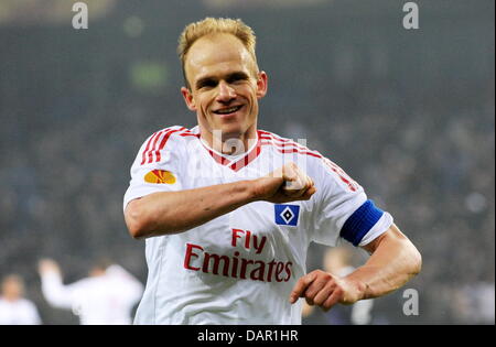 FILE - An archive picture dated 11 March 2010 shows Hamburg's soccer player David Jarolim cheering about his 3-1 goal against Anderlecht in Hamburg, germany. Jarolim is going to play his 300th Bundesliga match on 10 September 2011. Photo: Maurizio Gambarini Stock Photo