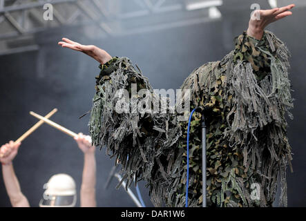 French singer Yelle (Julie Bude) performs in a camouflage costume at the Berlin Festival 2011 of the Berlin Music Week at the former Tempelhof airport in Berlin, Germany, 09 September 2011. 77 bands will perform at the two-day festival. Photo: Britta Pedersen Stock Photo