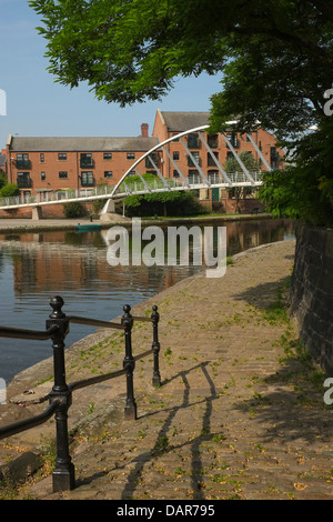 England, Manchester, Canal & suspension bridge in Castlefield area Stock Photo