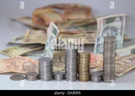 Indian Coins Stack in form of bar graph with Indian Rupees Stock Photo