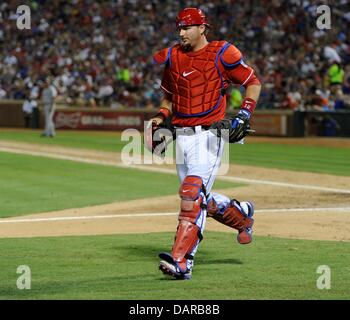 Texas Rangers catcher A.J. Pierzynski leaves the field with the Silver  Slugger Award for his play while on the Chicago White Sox in 2012,  presented before the Rangers' baseball game against the