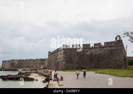 Africa, Mozambique, Mozambique Island. Teenagers outside of Forte de Sabastio. Stock Photo