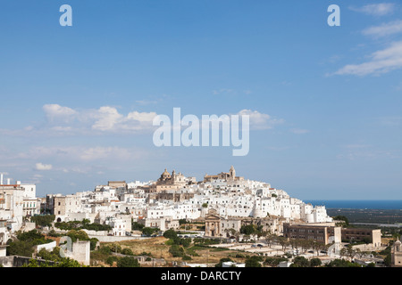 The medieval white hill town of Ostuni with whitewashed buildings in Apulia, southern Italy, in summer Stock Photo