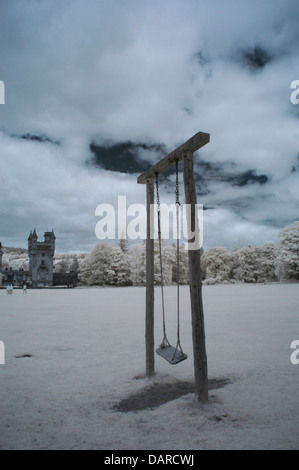 Vertical Infrared image of wooden swing used by Royal family children and possibly by Prince George in the future, at Balmoral. Stock Photo