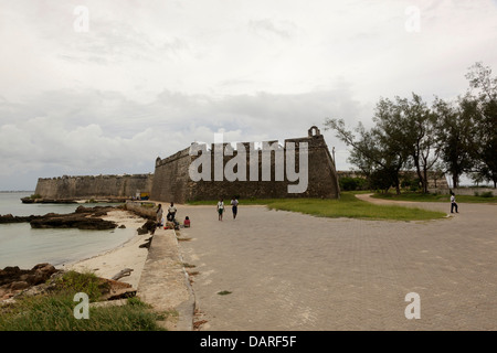 Africa, Mozambique, Mozambique Island. Teenagers outside of Forte de Sabastio. Stock Photo