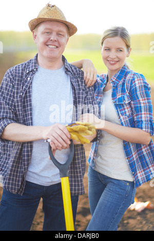 Image of two happy farmers looking at camera with smiles Stock Photo