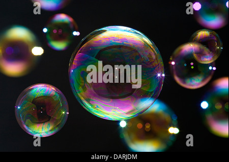 Many soap bubbles isolated on black. Extremely detailed. Stock Photo