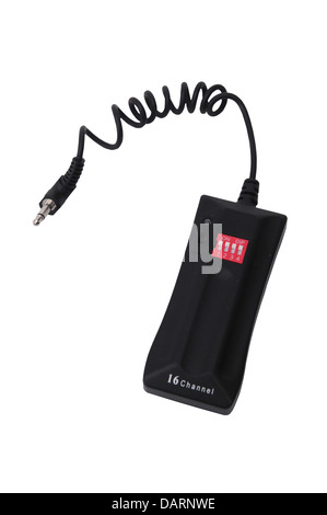 A black remote trigger on a white background Stock Photo