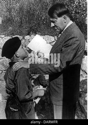 Hitler, Adolf, 20.4.1889 - 30.4.1945, German politician (NSDAP), with a boy, Obersalzberg, circa 1936,