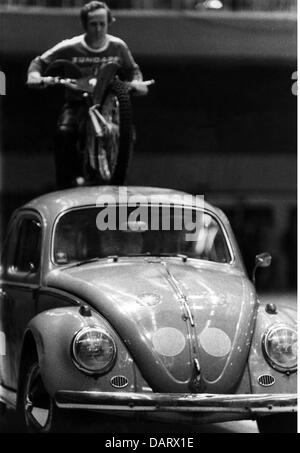 transport / transportation, motorcycle, show, Rolf Witthöfft driving with a off-road motorcycle over a VW beetle, 1972, Additional-Rights-Clearences-Not Available Stock Photo