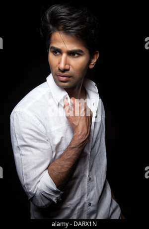 Young Indian man dressed in white Stock Photo