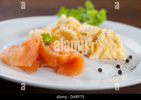 Smoked salmon and scrambled eggs Stock Photo