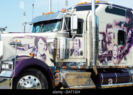 Custom American truck painted with Elvis artwork at an American car show. UK Stock Photo