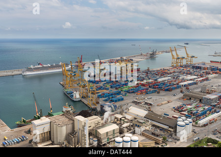 BARCELONA - MAY 16: Aerial view of the industrial harbor seen from mountain Montjuic on May 16, 2013 in Barcelona, Spain Stock Photo