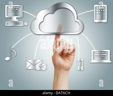 Hand with cloud computing concept in silver background Stock Photo