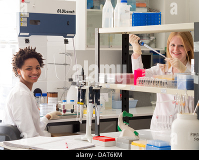 Scientists working in lab Stock Photo