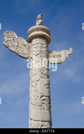 China, Beijing, Forbidden City (aka Zijin Cheng). Highly carved pillar at the entrance of the Forbidden City, detail. Stock Photo