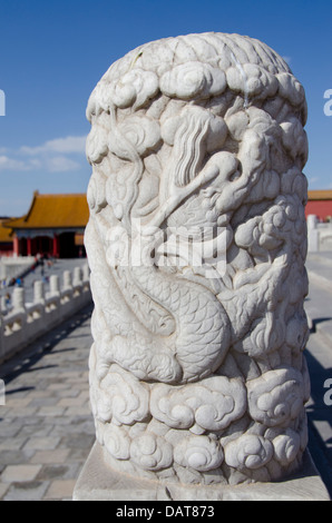 China, Beijing, Forbidden City (aka Zijin Cheng). Highly carved dragon design marble pillar. Stock Photo