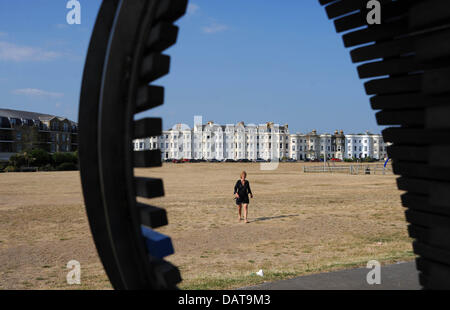 Littlehampton UK 18 July 2013 - Parched and burnt grass along Littlehampton seafront as the heatwave continues in Britain today Photograph taken by Simon Dack/Alamy Live News Stock Photo