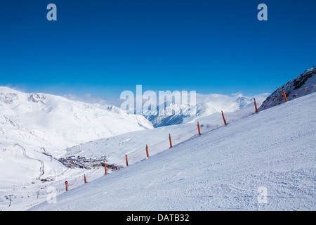 Ski piste for sking in mountains with panoramic landcape Stock Photo