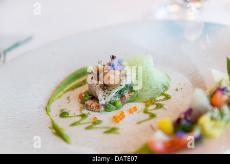 Dinning at Régis and Jacques MARCON’s Restaurant. One of Frances three Michelin star chefs. St Bonnet le Froid. Haute Loire. Stock Photo