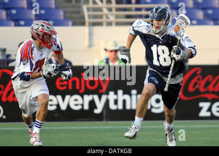 July 18, 2013 - Annapolis, Maryland, United States - July 18, 2013: Chesapeake Bayhawks #18 Ben Hunt advances past Boston Cannon's #28 Brent Adams at Navy-Marine Corps Memorial Stadium, in Annapolis, Maryland. Daniel Kucin Jr./ CSM Stock Photo