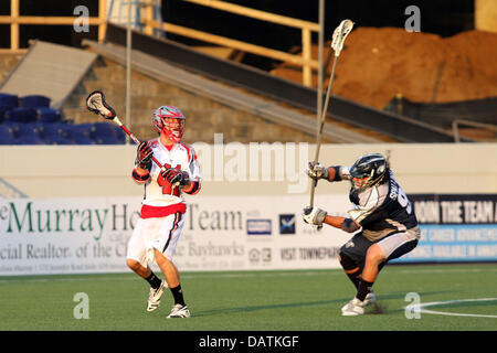 July 18, 2013 - Annapolis, Maryland, United States - July 18, 2013: Chesapeake Bayhawks #91 Brian Spallina tries to block a shot attempt by Boston Cannon's #41 Michael Stone at Navy-Marine Corps Memorial Stadium, in Annapolis, Maryland. Daniel Kucin Jr./ CSM Stock Photo