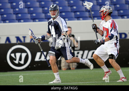 July 18, 2013 - Annapolis, Maryland, United States - July 18, 2013: Chesapeake Bayhawks #24 John Grant Jr. in action against Boston Cannon's #77 Mitch Belisle at Navy-Marine Corps Memorial Stadium, in Annapolis, Maryland. Daniel Kucin Jr./ CSM Stock Photo