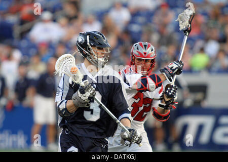 July 18, 2013 - Annapolis, Maryland, United States - July 18, 2013: Chesapeake Bayhawks #3 Matt Abbott races past Boston Cannon's #32 Jon Hayes at Navy-Marine Corps Memorial Stadium, in Annapolis, Maryland. Daniel Kucin Jr./ CSM Stock Photo