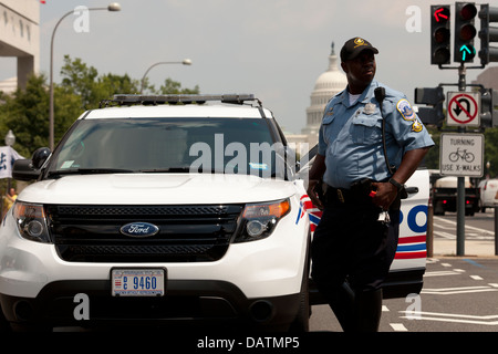 Policeman blocking road near the US Capitol - Washington, DC USA Stock Photo