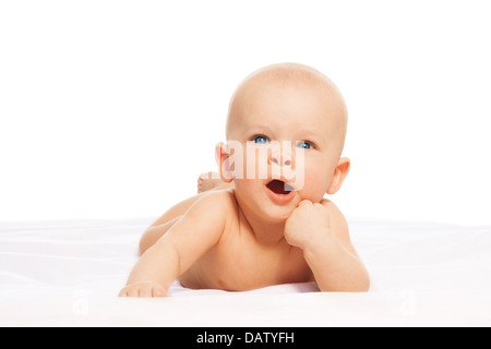 Happy little boy laying on blanket, isolated on white Stock Photo