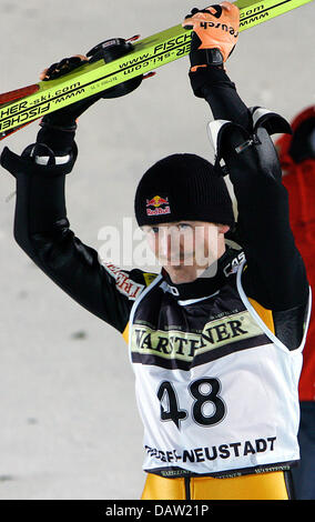 Polish ski jumper Adam Malysz cheers winning at the Hochfirst jump of Titisee-Neustadt, Germany, 03 February 2007. Photo: Patrick Seeger Stock Photo