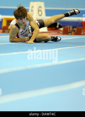 German Christian Blum lies on the floor after a false start to the 60m Semi-Finals of the European Athletics Indoor Championships in Birmingham, United Kingdom, Saturday, 03 March 2007. Photo: Arne Dedert Stock Photo