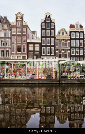 Floating Flower Market and Dutch style historic houses in Amsterdam, Netherlands, North Holland. Stock Photo