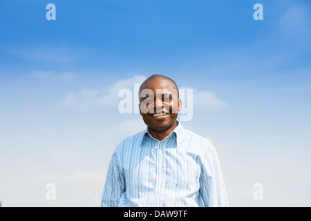 Portrait of happy black adult man with big toothy smile Stock Photo