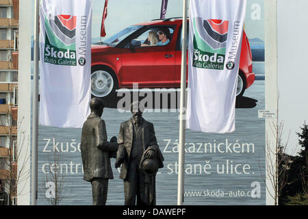 Two sculpture depicting Skoda founders Vaclav Klement and Vaclav Laurin are pictured in front a Skoda billboard at the Skoda auto museum in Mlada Boleslav, Czech Republic, 19 March 2007.  Photo: Bjoern Steinz Stock Photo