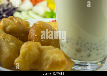 close-up soybean milk and deep-fried dough stick for breakfast Stock Photo