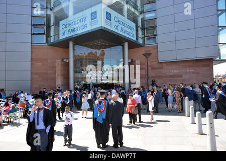 19 July 2013  Manchester Metropolitan University Graduation, Manchester, UK  Students from MMU wait outside The Bridgewater Hall before receiving their degrees. Credit:  John Fryer/Alamy Live News Stock Photo