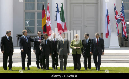 (L-R) Canadian Prime Minister Stephen Harper, British Prime Mininster Tony Blair, President of the EU Commission Jose Manuel Barroso, French President Nicolas Sarkozy, Russian President Vladimir Putin, Japanese Prime Minister Shinzo Abe, German Chancellor Angela Merkel, Italian Prime Minister Romano Prodi and US President George W. Bush line up for a photo before the first session  Stock Photo