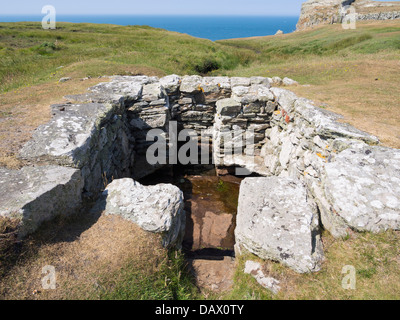 Legendary St Gwenfaen's holy well or Ffynnon Wenfaen on coastal path near Rhoscolyn Holy Island Isle of Anglesey North Wales UK Stock Photo