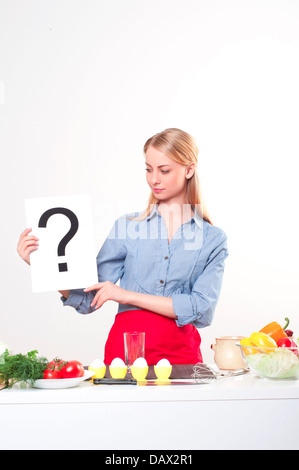 portrait of a young woman, hold question mark Stock Photo